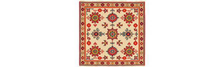 Hand-woven Turkish carpet with intricate geometric and floral patterns in rich natural colors on a neutral background.