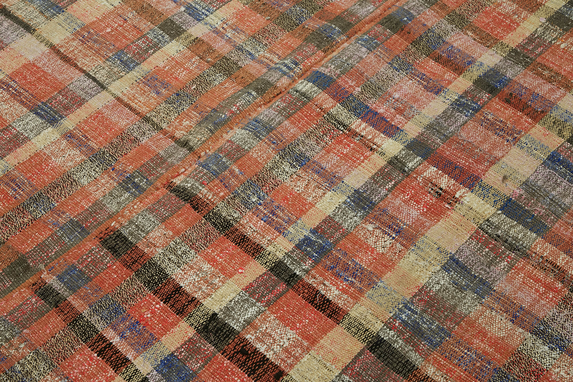 Handmade flatweave kilim rug with low-profile woven texture and geometric pattern