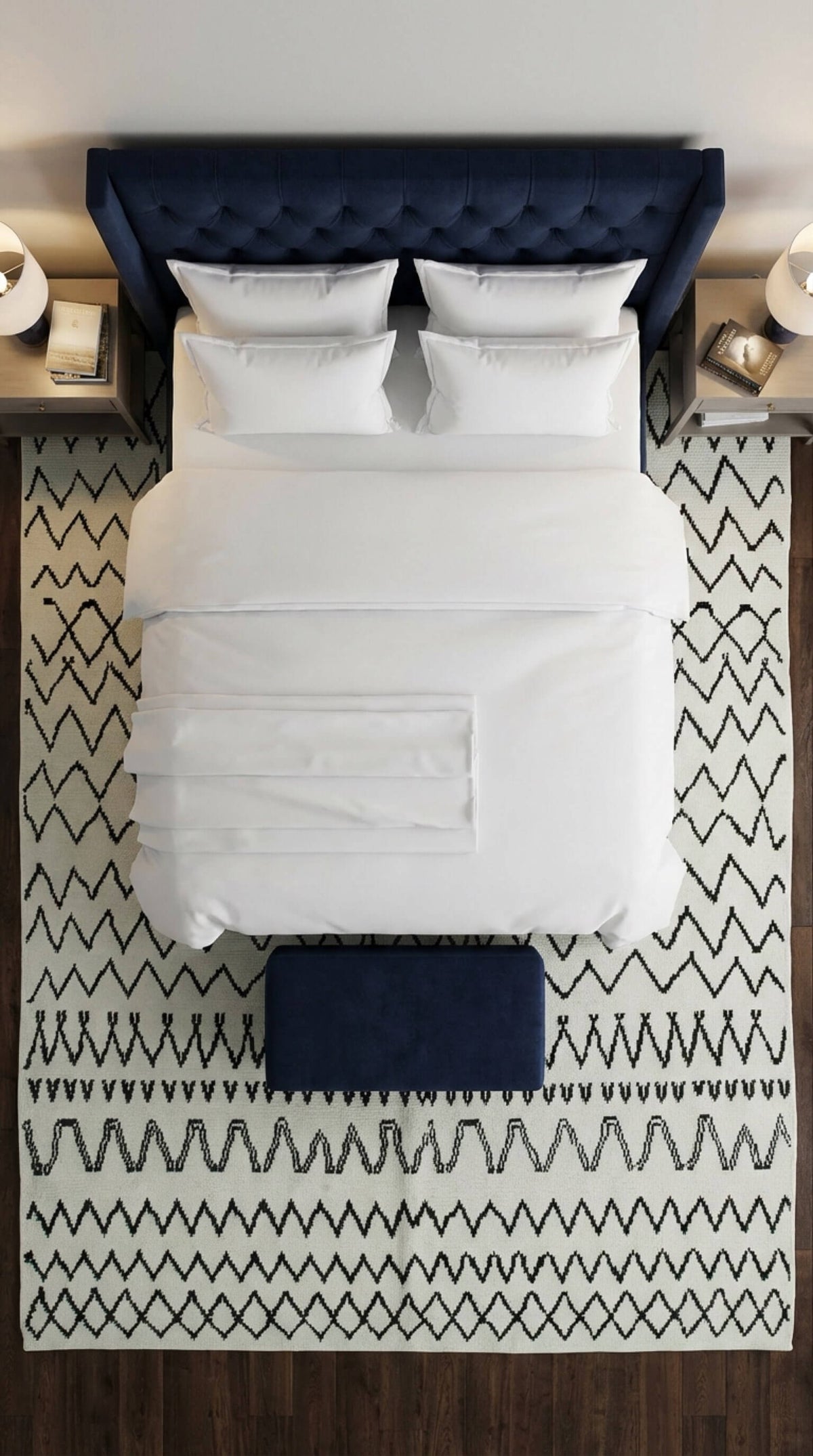 Black and white Moroccan rug with geometric patterns styled in a modern bedroom beneath a bed, adding texture and contrast.